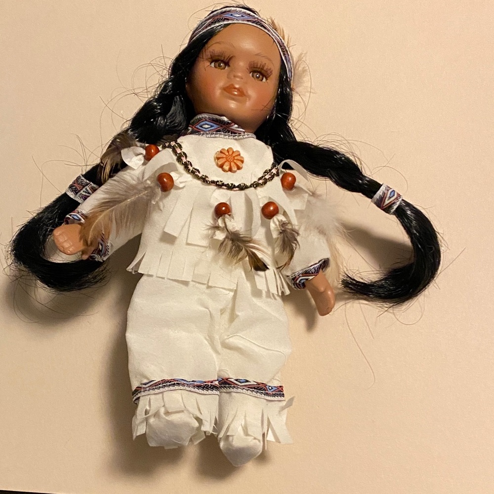 Native American Decorative Doll with White Outfit and Black Hair